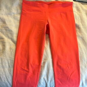 UA neon coral capris